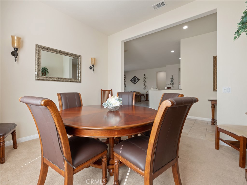 10588 Archerwill Road Apple Valley, CA 92308 - Photo 14 of 35 a view of a dining room with furniture