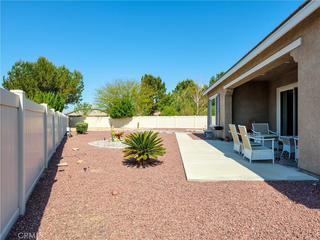 10588 Archerwill Road Apple Valley, CA 92308 - Photo 34 of 35 a swimming pool with a yard