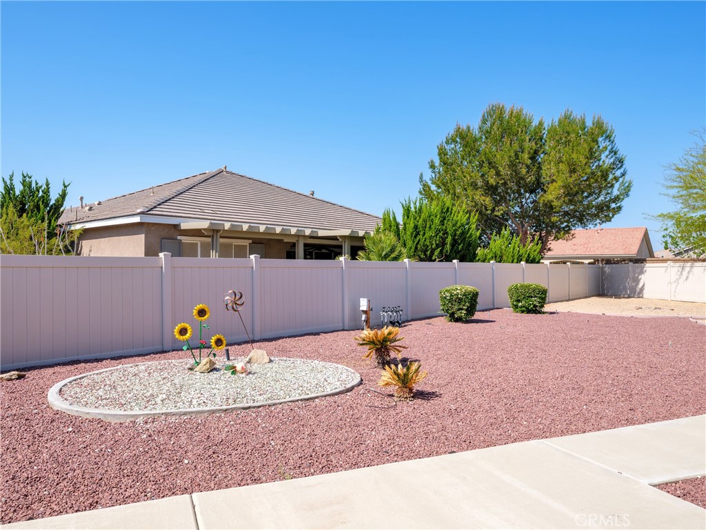 10588 Archerwill Road Apple Valley, CA 92308 - Photo 35 of 35 a view of a house with a swimming pool