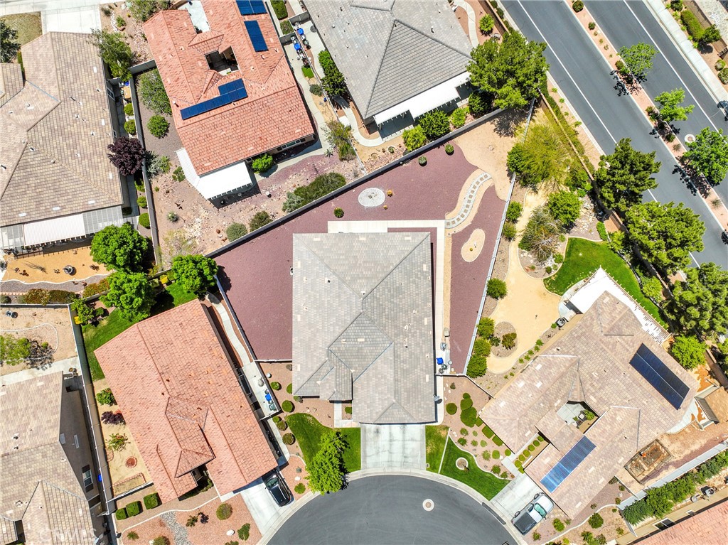 10588 Archerwill Road Apple Valley, CA 92308 - Photo 4 of 35 an aerial view of a house with garden space and street view