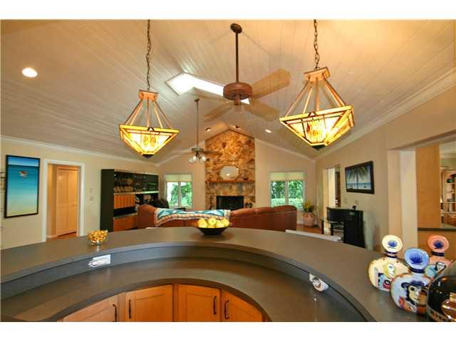 2640 Northwest Collins Cove Road Stuart, FL 34994 - Photo 13 of 21 a view of a living room and a chandelier
