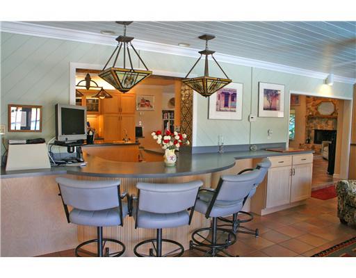 2640 Northwest Collins Cove Road Stuart, FL 34994 - Photo 14 of 21 a dining room with furniture and window