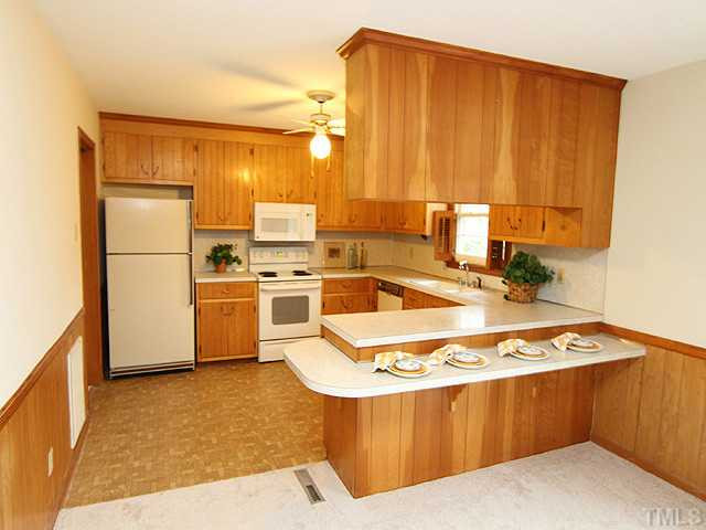 201 Barclay Road Durham, NC 27712 - Photo 8 of 25 Well designed kitchen includes all appliances with new microwave. Double sink has window above, overlooking back yard. Plenty of cabinets and counter space for the busy cook. Kitchen