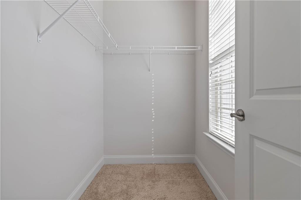 3437 Sumersbe Court Atlanta, GA 30349 - Photo 15 of 25 a view of an empty room with a window