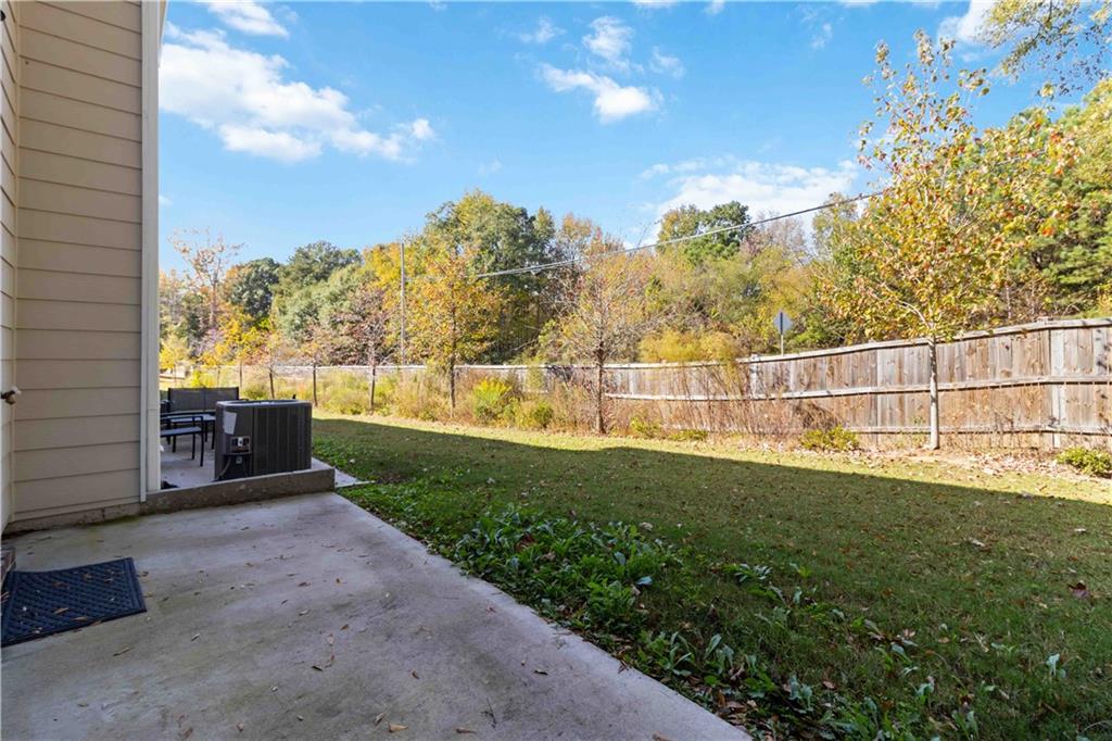 3437 Sumersbe Court Atlanta, GA 30349 - Photo 25 of 25 a view of a garden with an outdoor space
