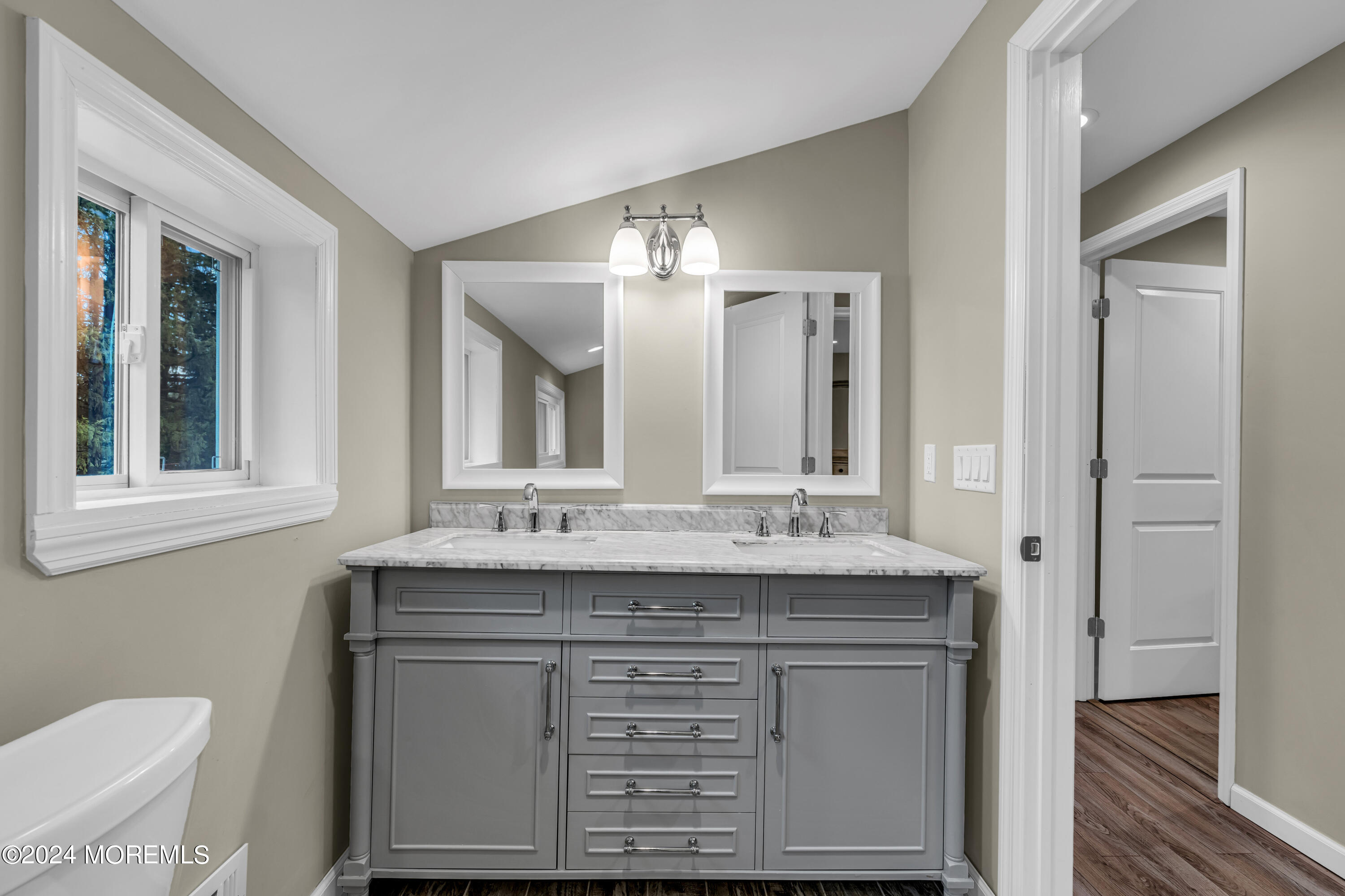 2 Maple Avenue Freehold, NJ 07728 - Photo 26 of 41 a bathroom with a granite countertop sink a toilet and a mirror