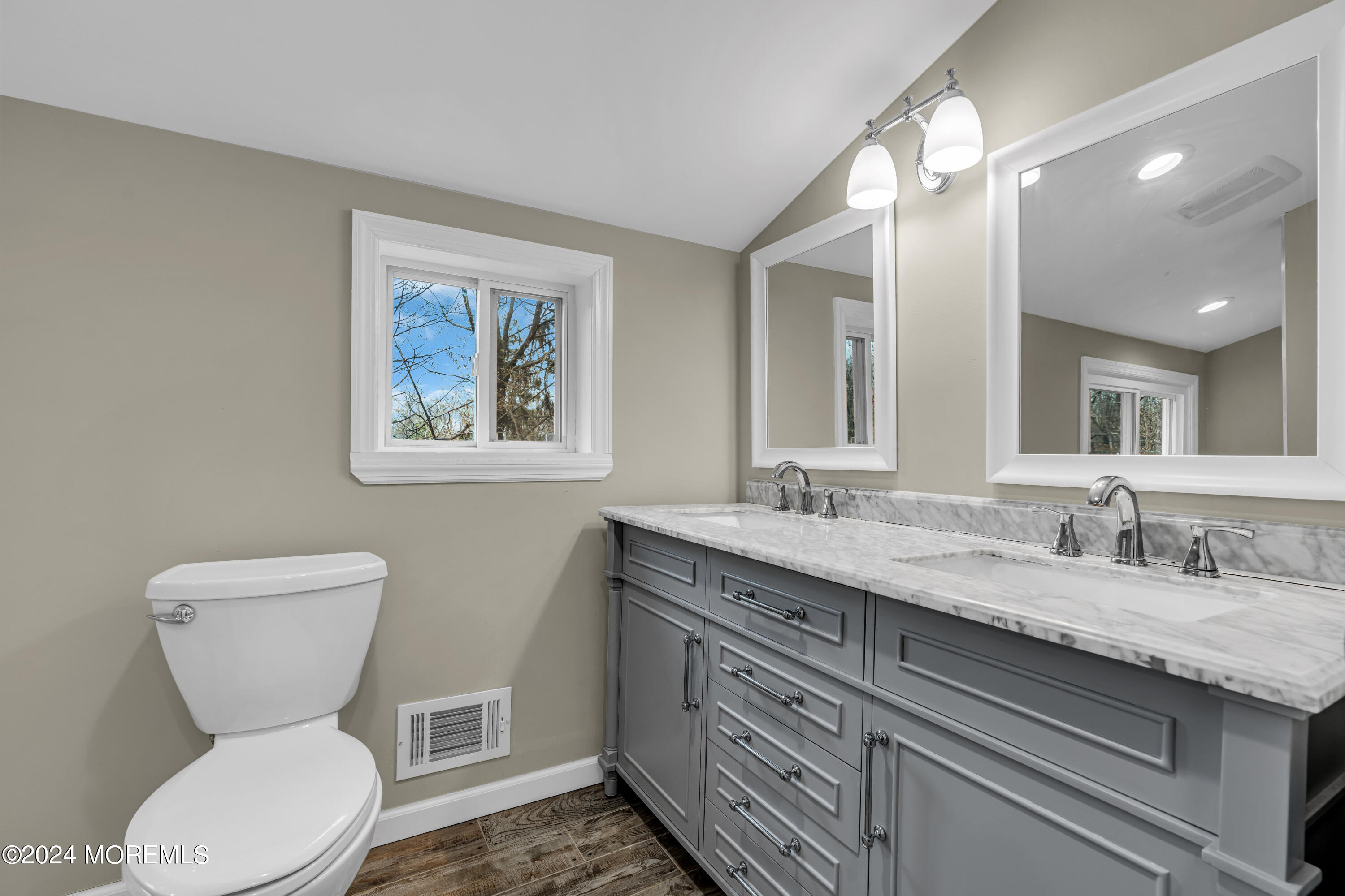 2 Maple Avenue Freehold, NJ 07728 - Photo 27 of 41 a bathroom with a toilet sink and mirror