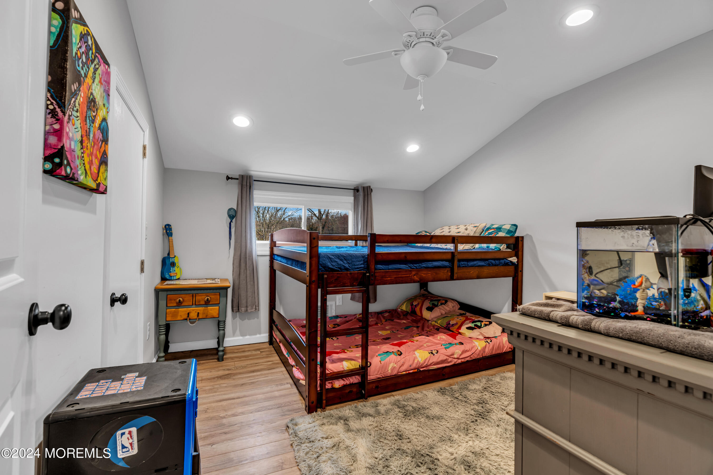 2 Maple Avenue Freehold, NJ 07728 - Photo 29 of 41 a bedroom with furniture and a book shelf