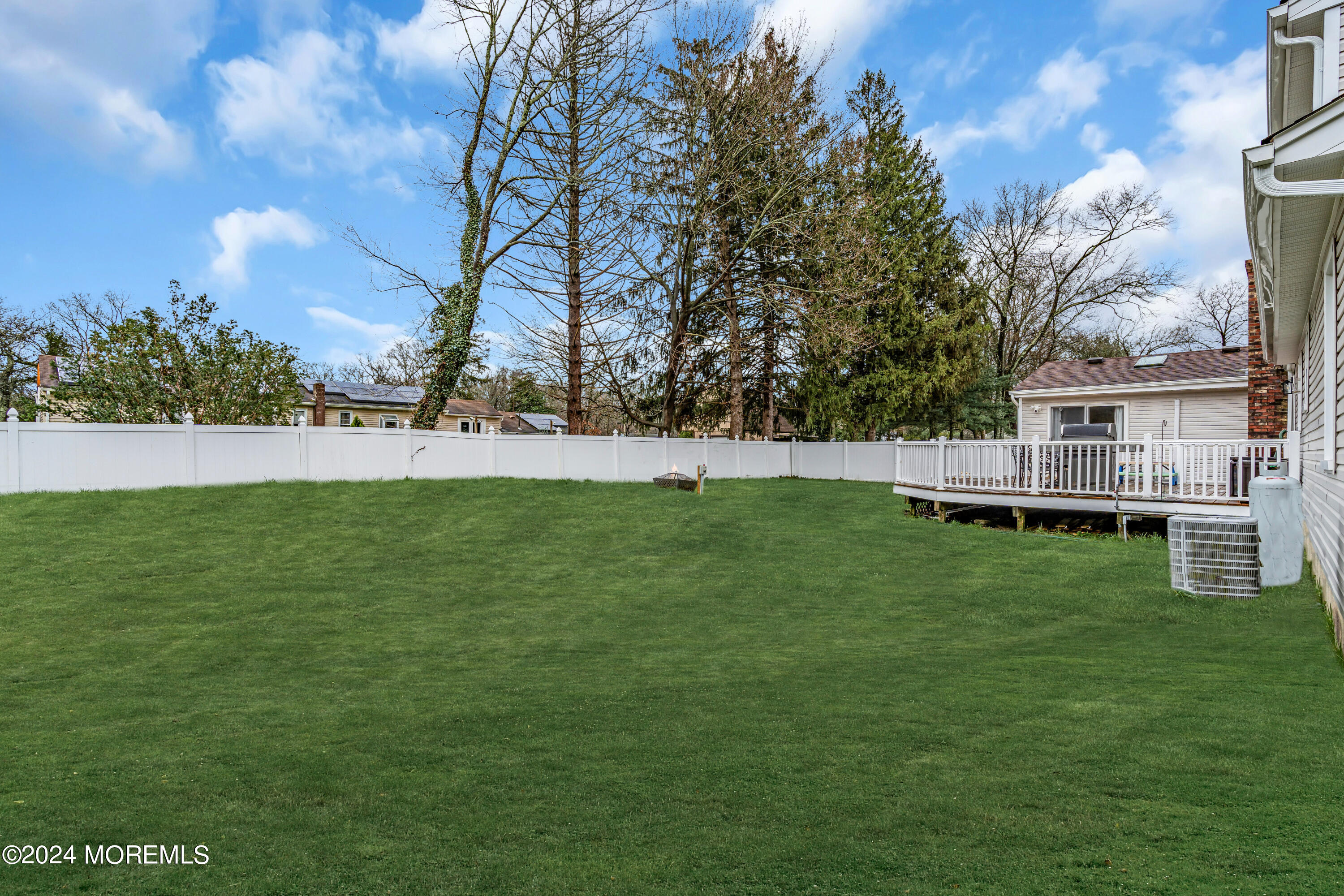 2 Maple Avenue Freehold, NJ 07728 - Photo 35 of 41 a view of yard with swimming pool and green space