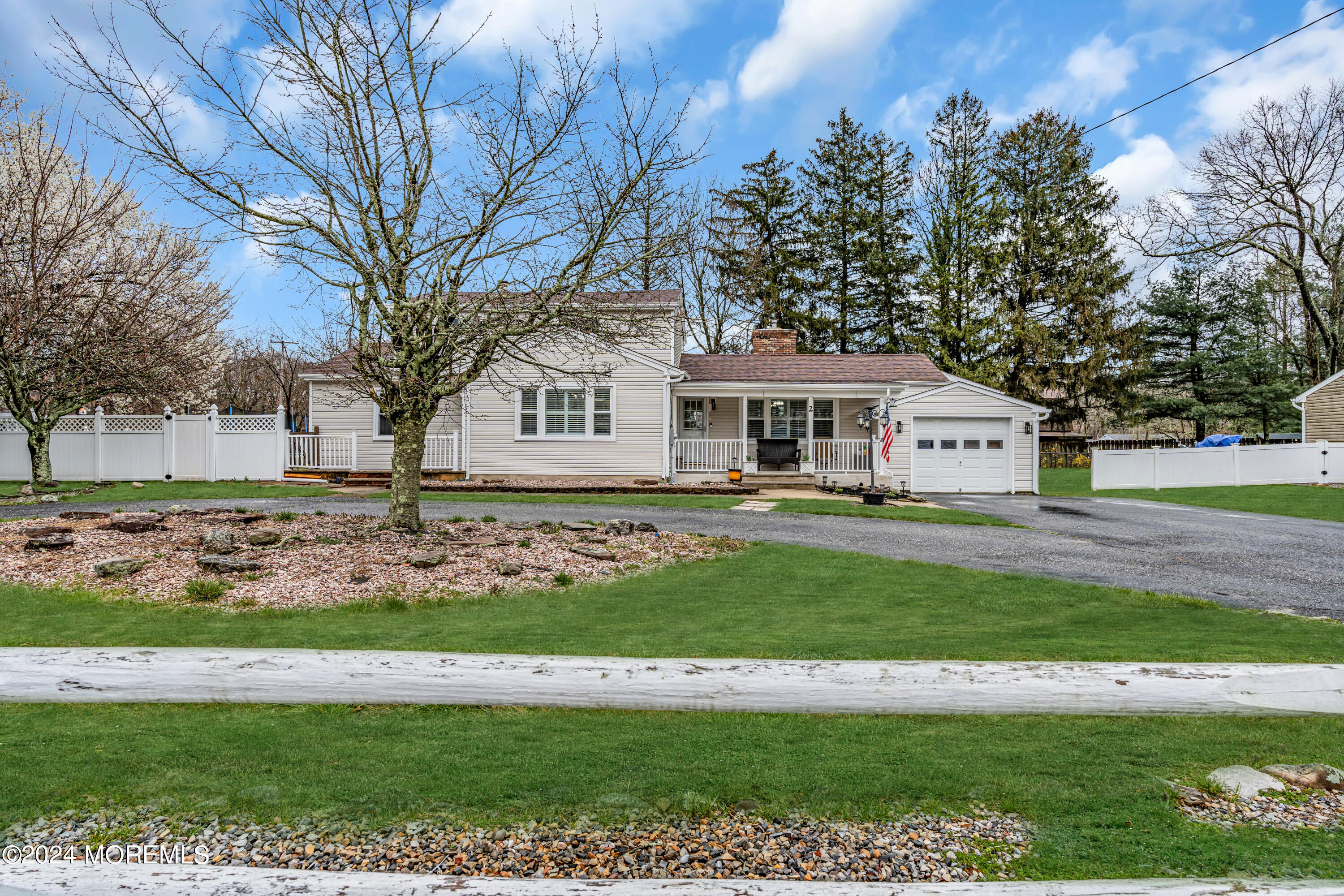 2 Maple Avenue Freehold, NJ 07728 - Photo 40 of 41 a front view of a house with a yard