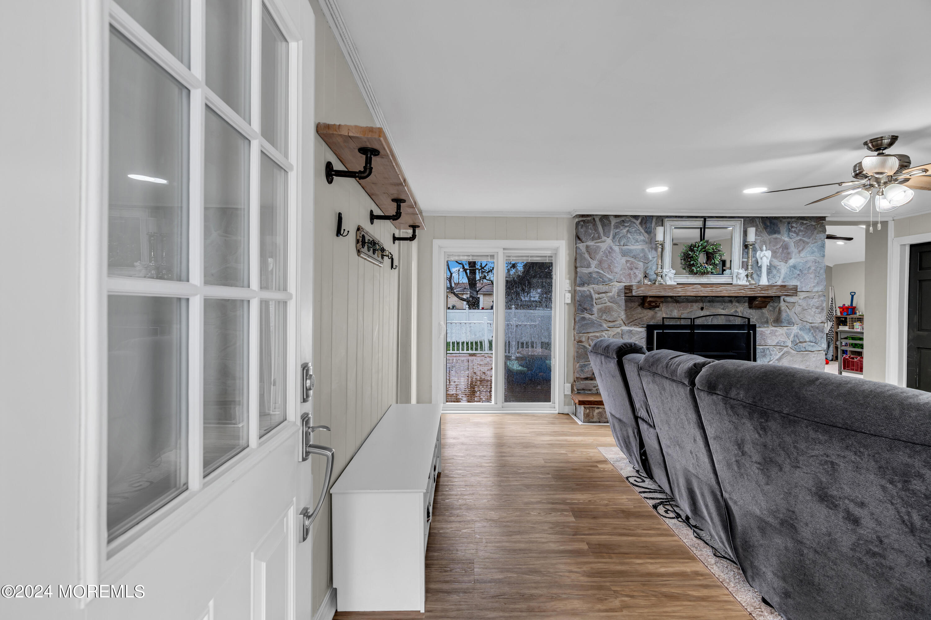 2 Maple Avenue Freehold, NJ 07728 - Photo 6 of 41 a living room with furniture and a fireplace