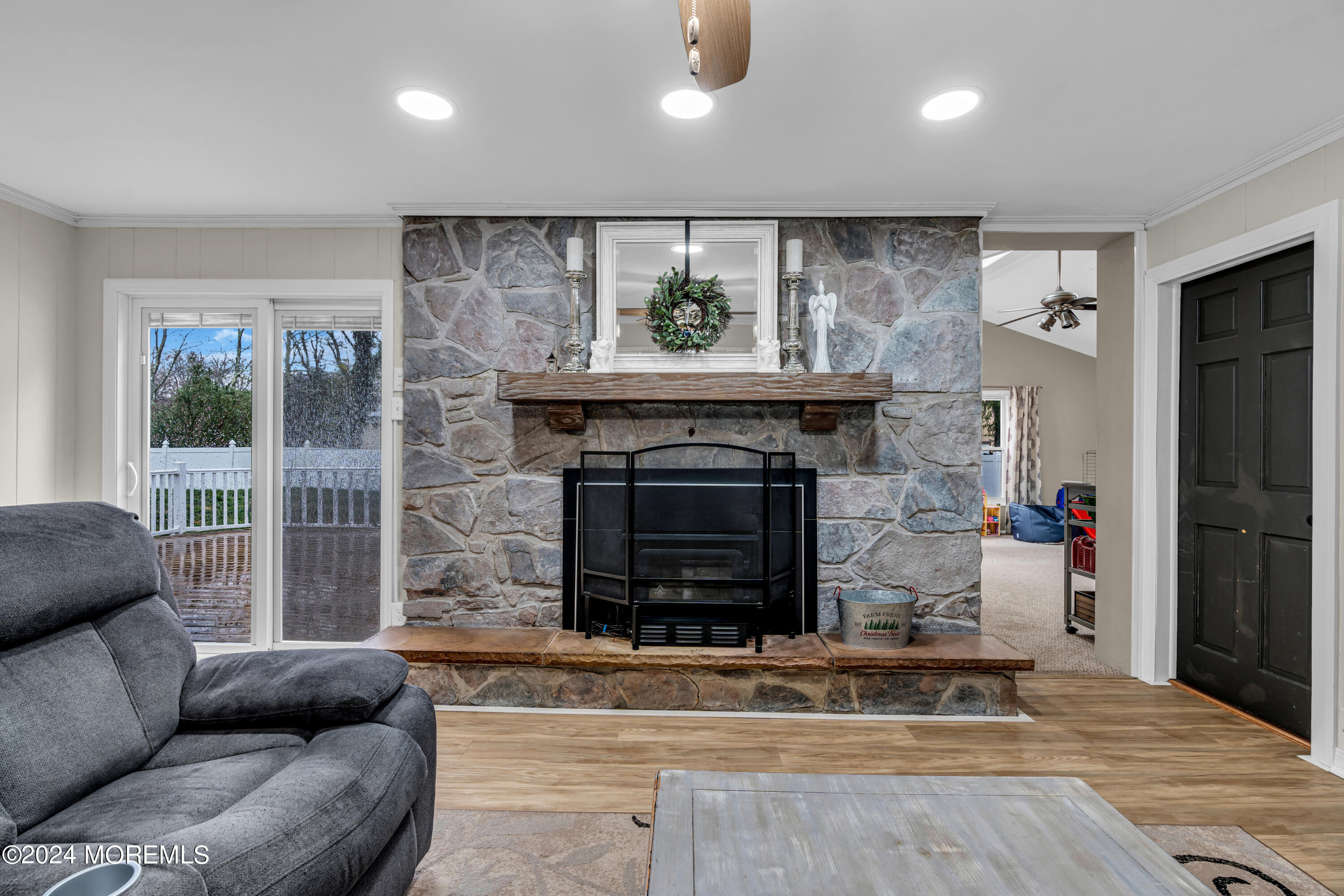 2 Maple Avenue Freehold, NJ 07728 - Photo 7 of 41 a living room with furniture and a fireplace