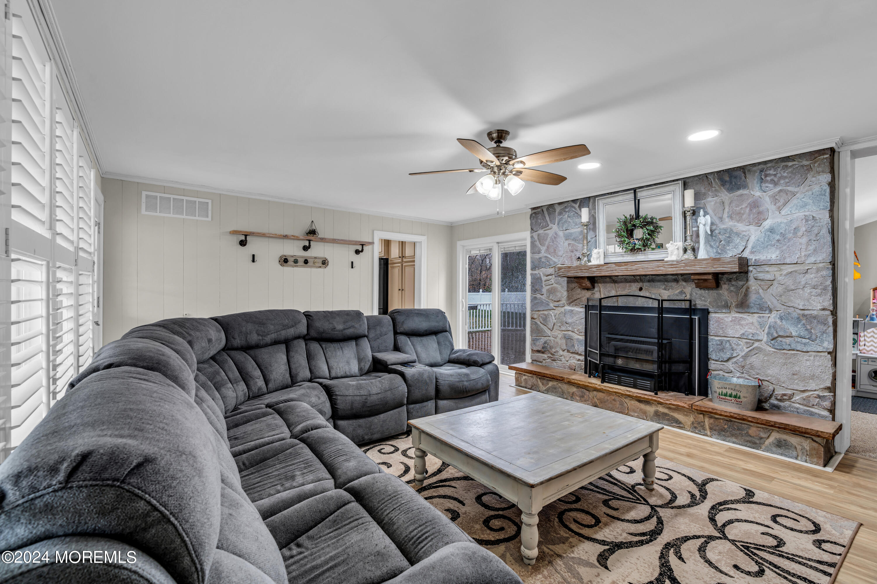 2 Maple Avenue Freehold, NJ 07728 - Photo 8 of 41 a living room with furniture and a fireplace