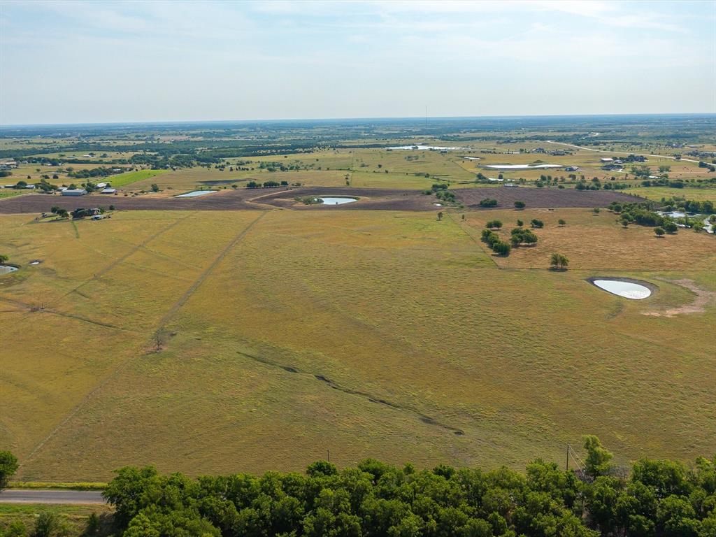 Tbd Lot 8 Tbd Road Ennis, TX 75119 - Photo 13 of 17 a view of an ocean and beach