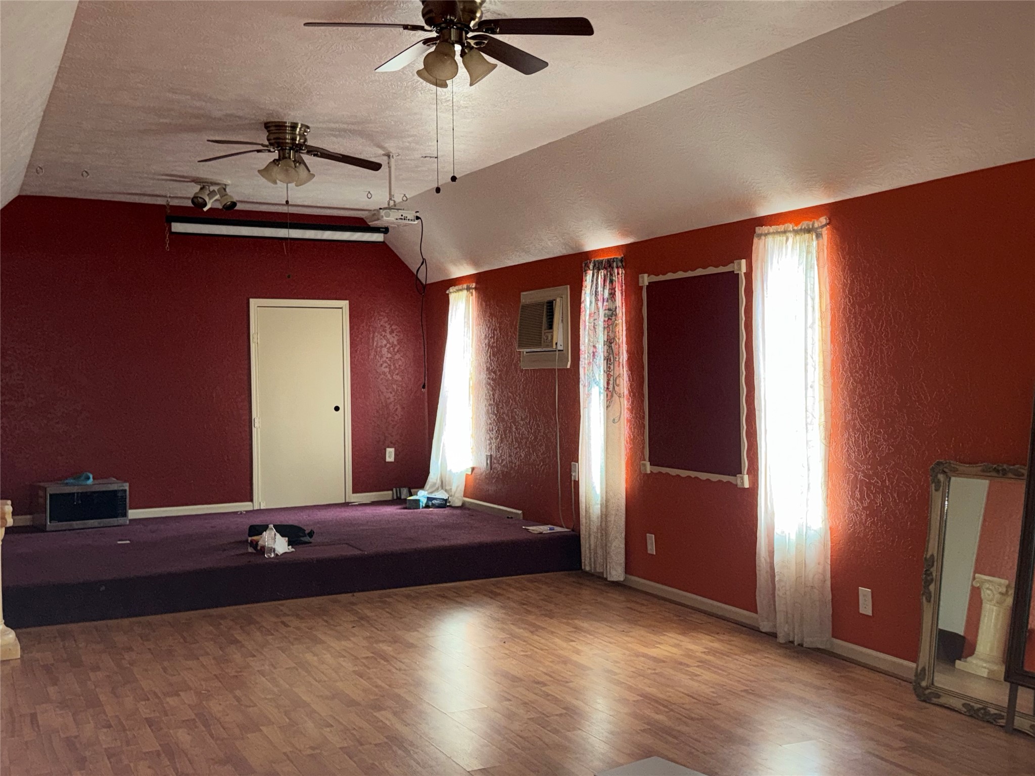 412 Waco Street Conroe, TX 77301 - Photo 16 of 50 a view of a livingroom with furniture and a ceiling fan