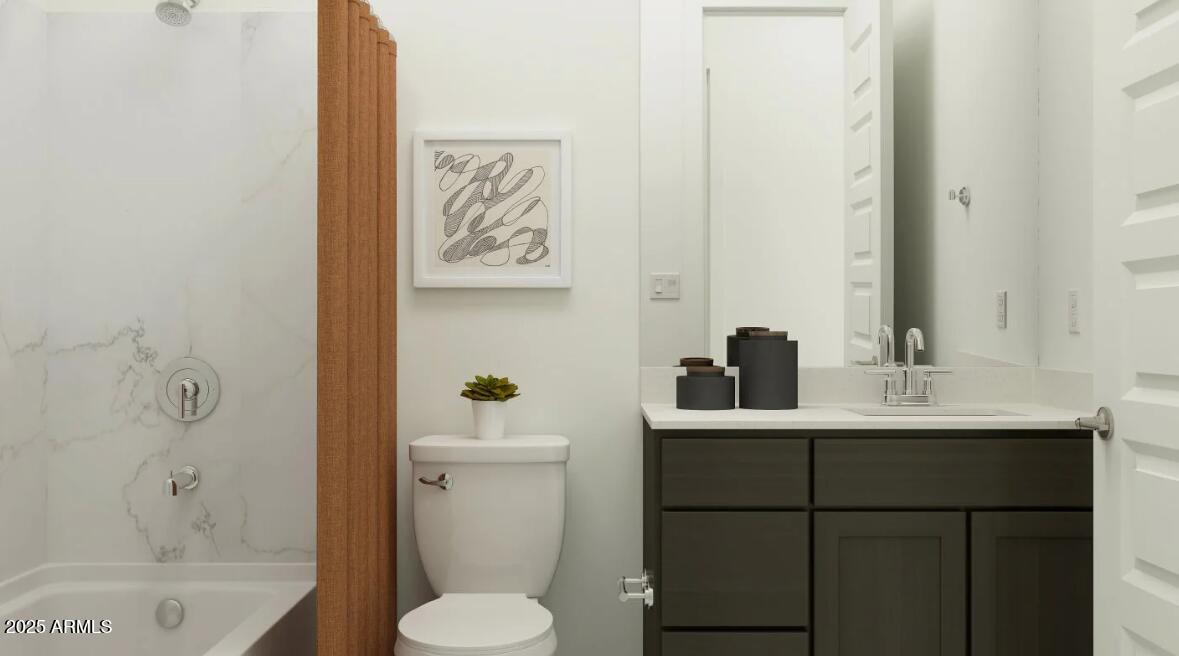 9646 West Flower Street Phoenix, AZ 85037 - Photo 16 of 25 a bathroom with a sink toilet and shower