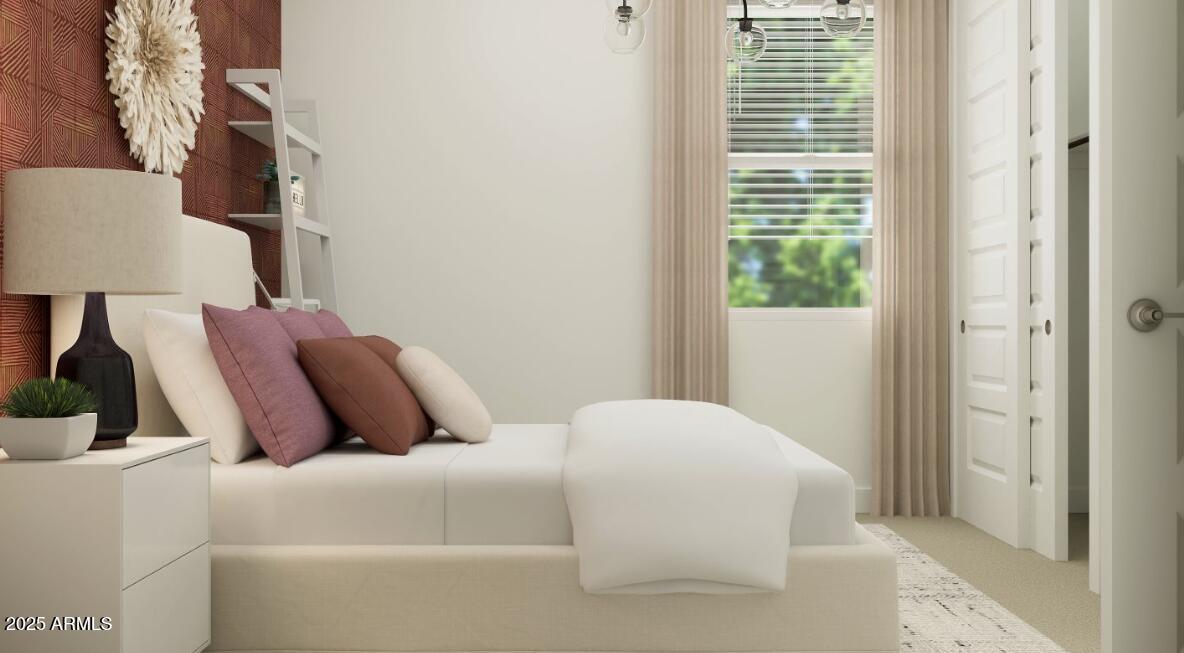 9646 West Flower Street Phoenix, AZ 85037 - Photo 18 of 25 a bedroom with a bed and a lamp