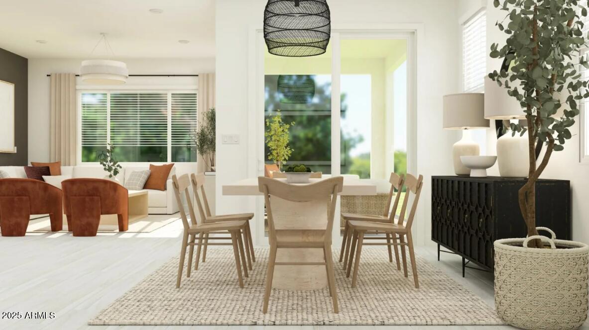 9646 West Flower Street Phoenix, AZ 85037 - Photo 5 of 25 a dining room with furniture and window