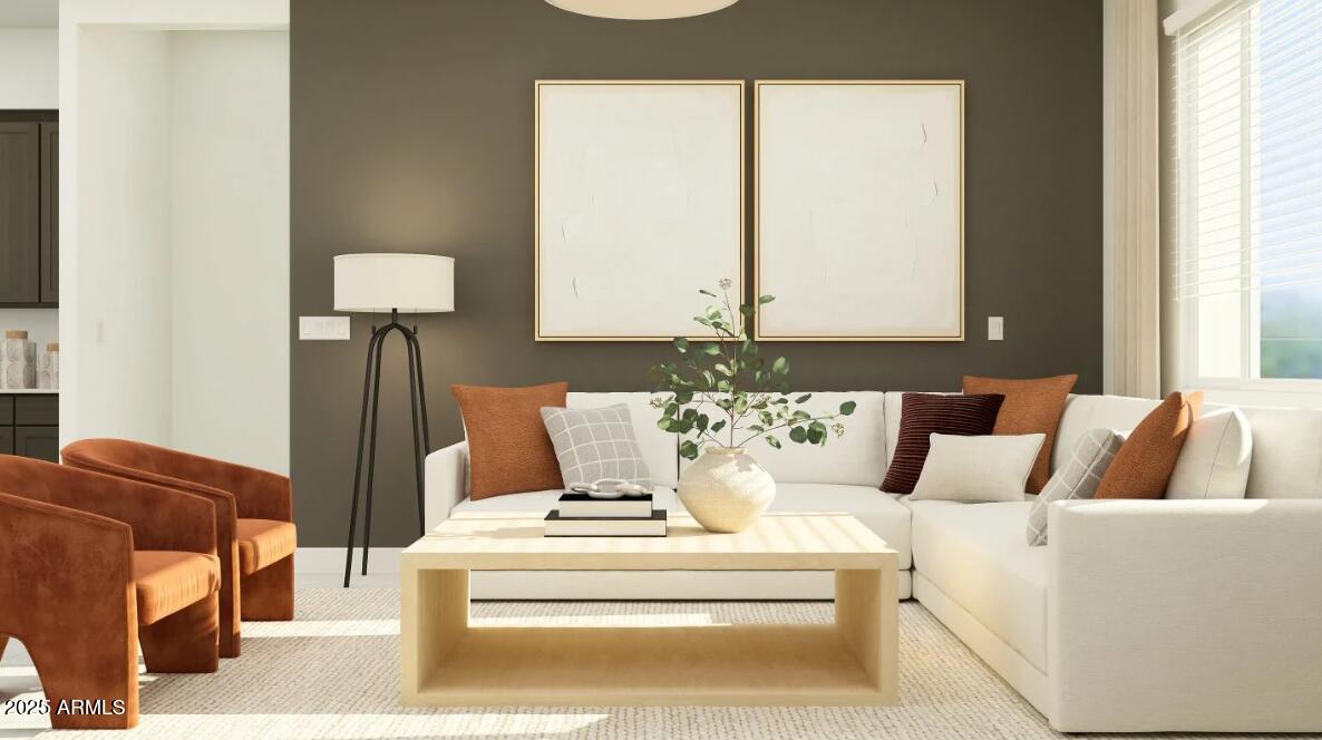 9646 West Flower Street Phoenix, AZ 85037 - Photo 6 of 25 a living room with furniture and a lamp