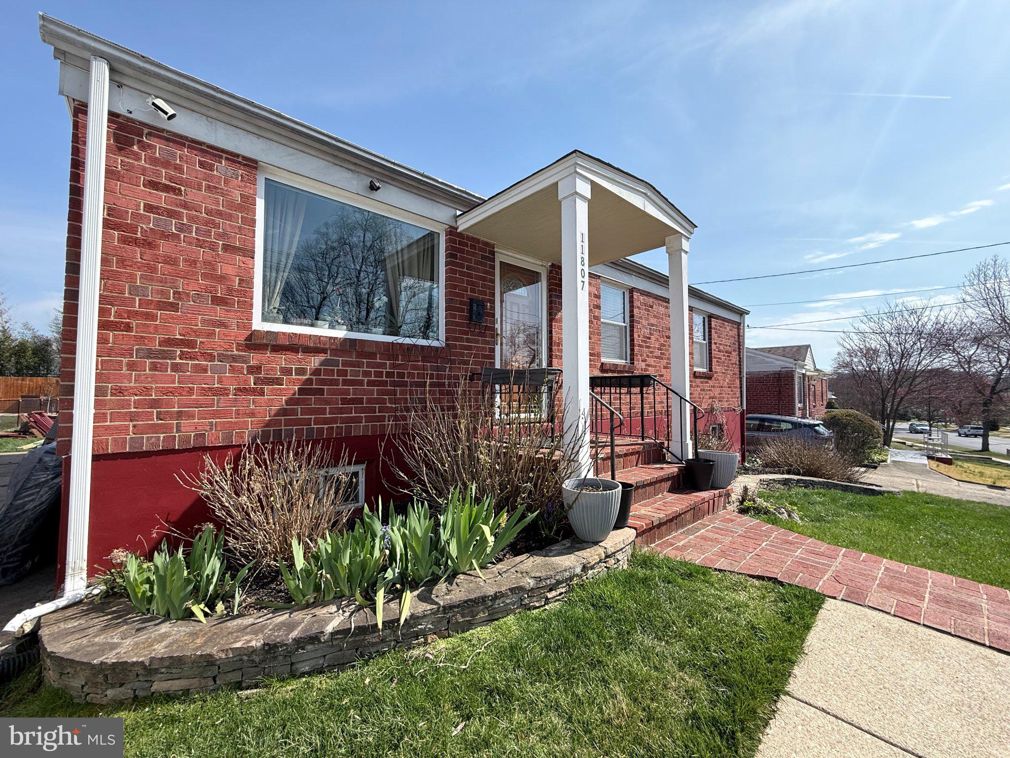 11807 Rocking Horse Road Rockville, MD 20852 - Photo 2 of 3 Charming brick home with inviting entry.