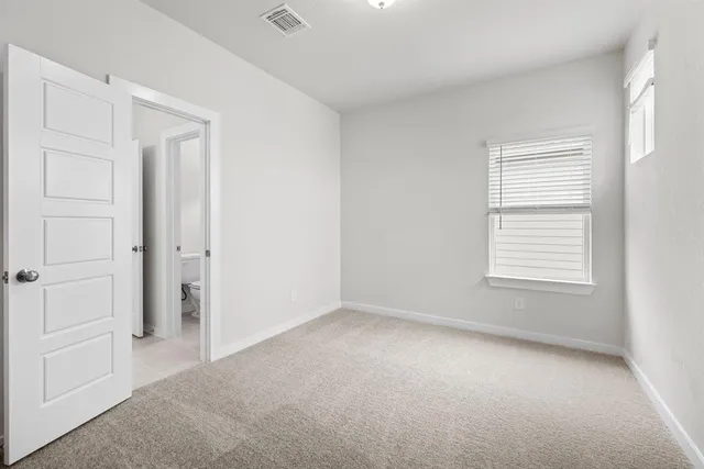 an empty room with a window