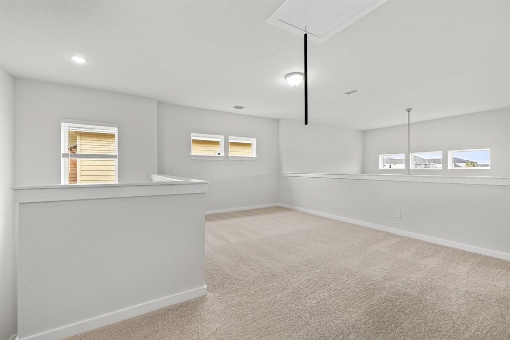 112 Alicante Lane Georgetown, TX 78628 - Photo 26 of 36 a view of an empty room with a window