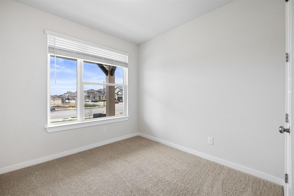 112 Alicante Lane Georgetown, TX 78628 - Photo 29 of 36 an empty room with a window