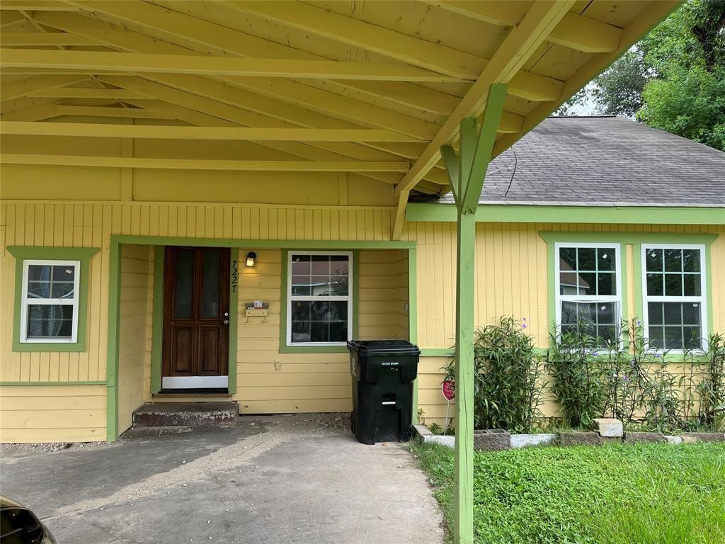 7227 St Augustine Street Houston, TX 77021 - Photo 2 of 20 a view of yellow house with front door