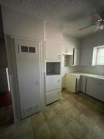 a utility room with washer and dryer