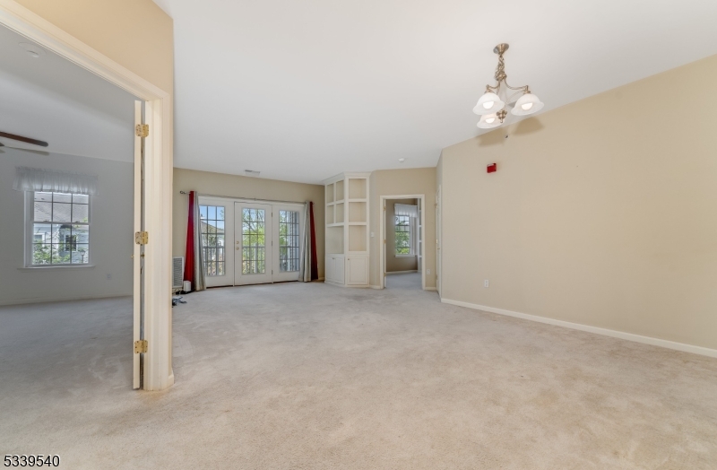 6015 Brookfield Glen Drive, Unit 15 Belvidere, NJ 07823 - Photo 13 of 48 an empty room with windows