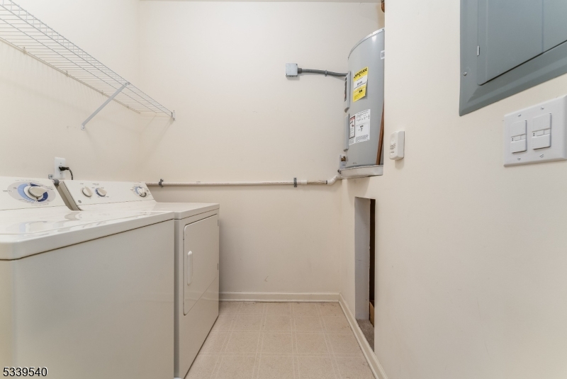 6015 Brookfield Glen Drive, Unit 15 Belvidere, NJ 07823 - Photo 22 of 48 a utility room with dryer and washer