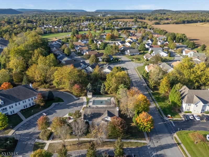 6015 Brookfield Glen Drive, Unit 15 Belvidere, NJ 07823 - Photo 33 of 48 an aerial view of residential houses with outdoor space