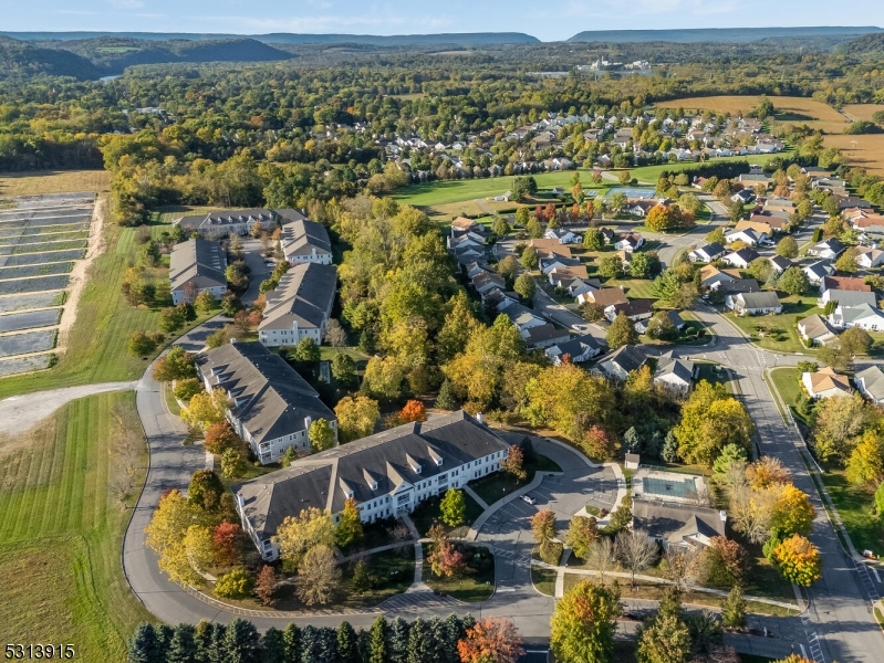 6015 Brookfield Glen Drive, Unit 15 Belvidere, NJ 07823 - Photo 34 of 48 an aerial view of a house with a lake view