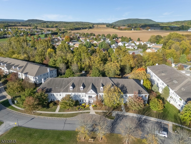 6015 Brookfield Glen Drive, Unit 15 Belvidere, NJ 07823 - Photo 35 of 48 an aerial view of a house with a lake view