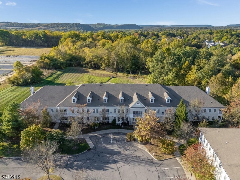 6015 Brookfield Glen Drive, Unit 15 Belvidere, NJ 07823 - Photo 40 of 48 an aerial view of a house with a garden