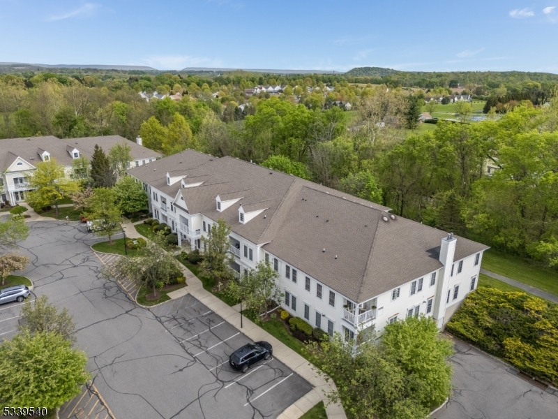 6015 Brookfield Glen Drive, Unit 15 Belvidere, NJ 07823 - Photo 42 of 48 a view of a city with a lake