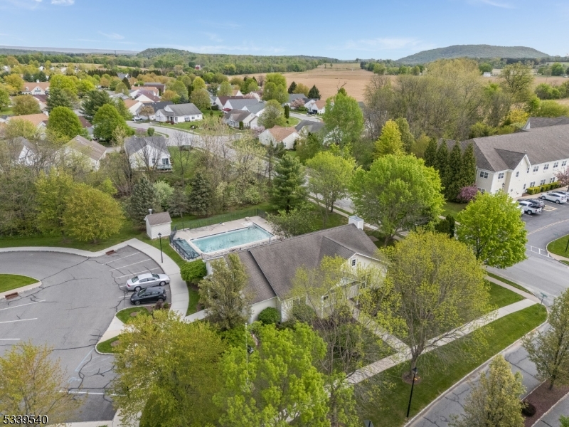 6015 Brookfield Glen Drive, Unit 15 Belvidere, NJ 07823 - Photo 46 of 48 an aerial view of a house with a yard