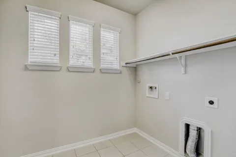 a view of walk in closet with window