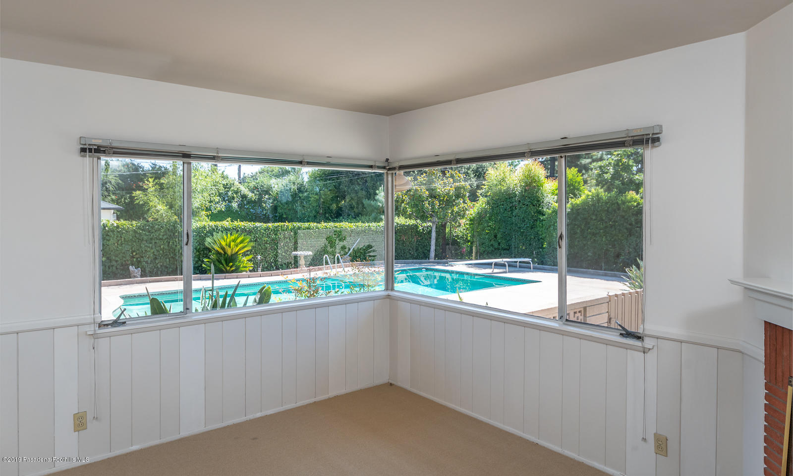3810 Greenhill Road Pasadena, CA 91107 - Photo 16 of 29 a view of a room with a large window