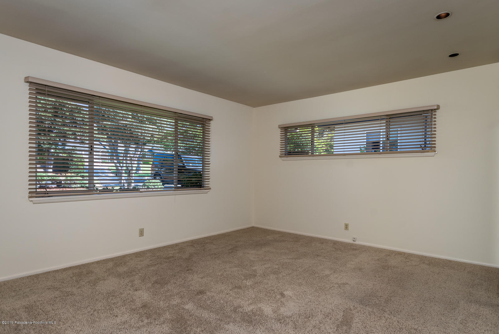 3810 Greenhill Road Pasadena, CA 91107 - Photo 17 of 29 a view of an empty room with a window
