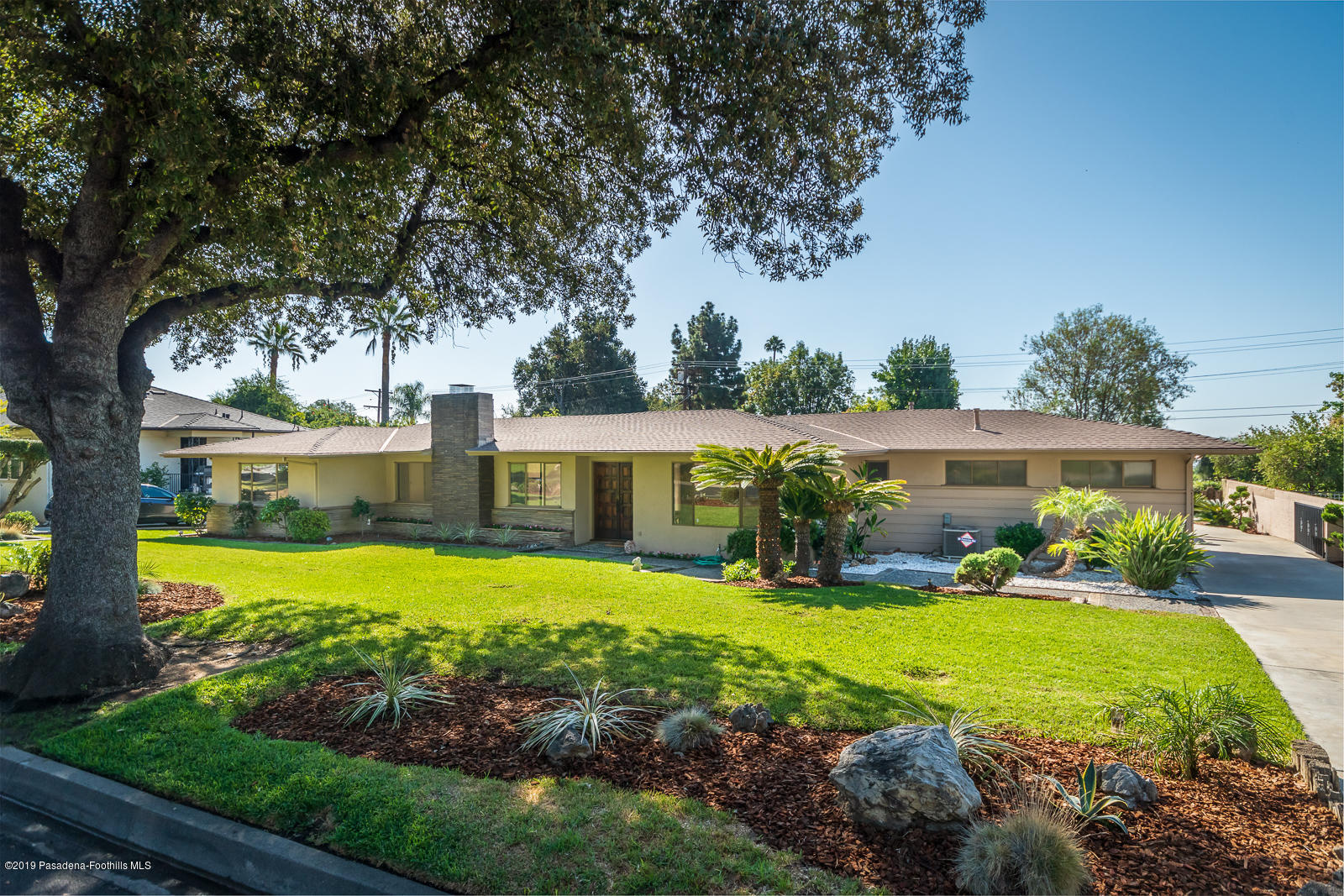 3810 Greenhill Road Pasadena, CA 91107 - Photo 3 of 29 a view of a house with garden
