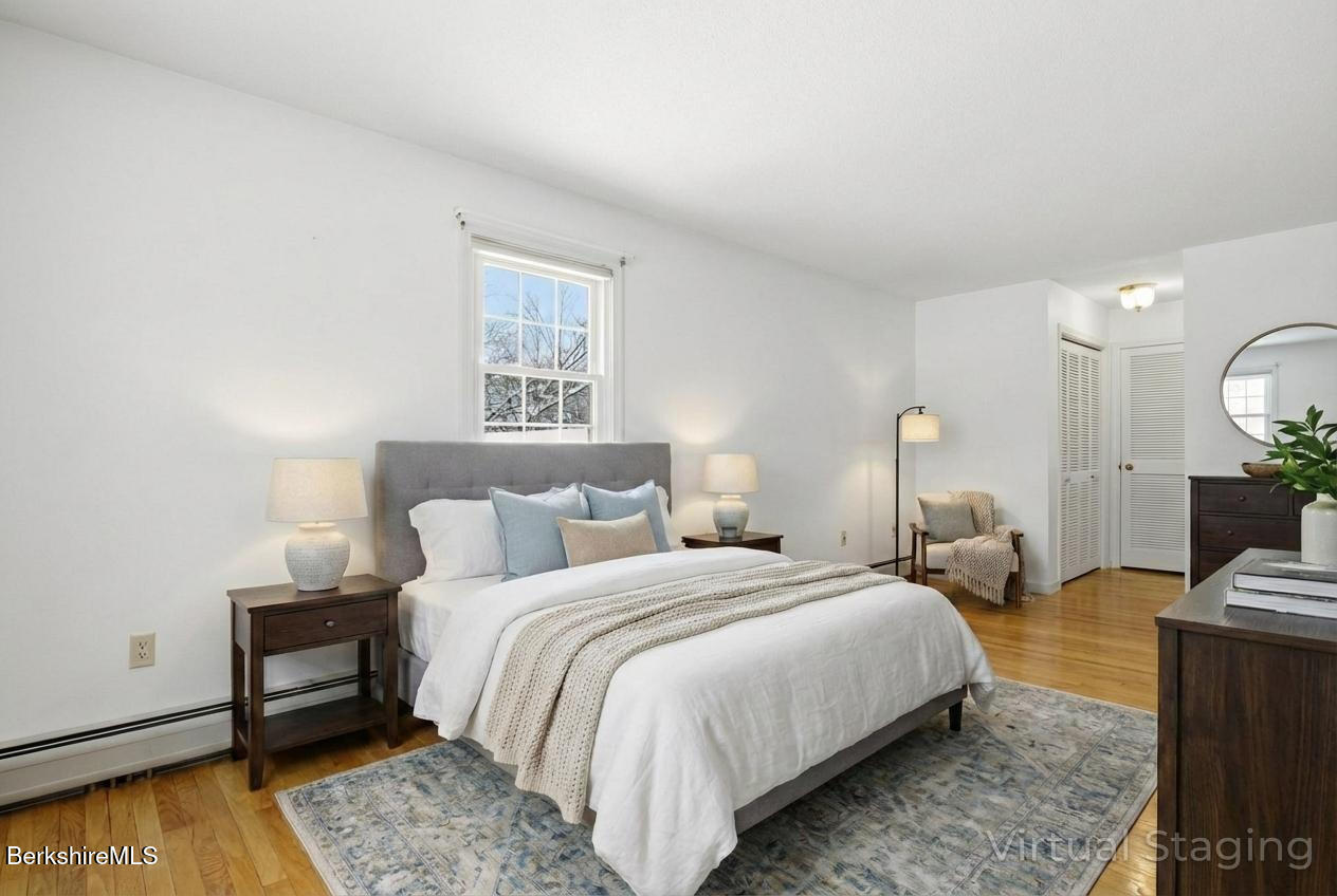 121 Kittredge Road Pittsfield, MA 01201 - Photo 23 of 38 a bedroom with bed and a night stand