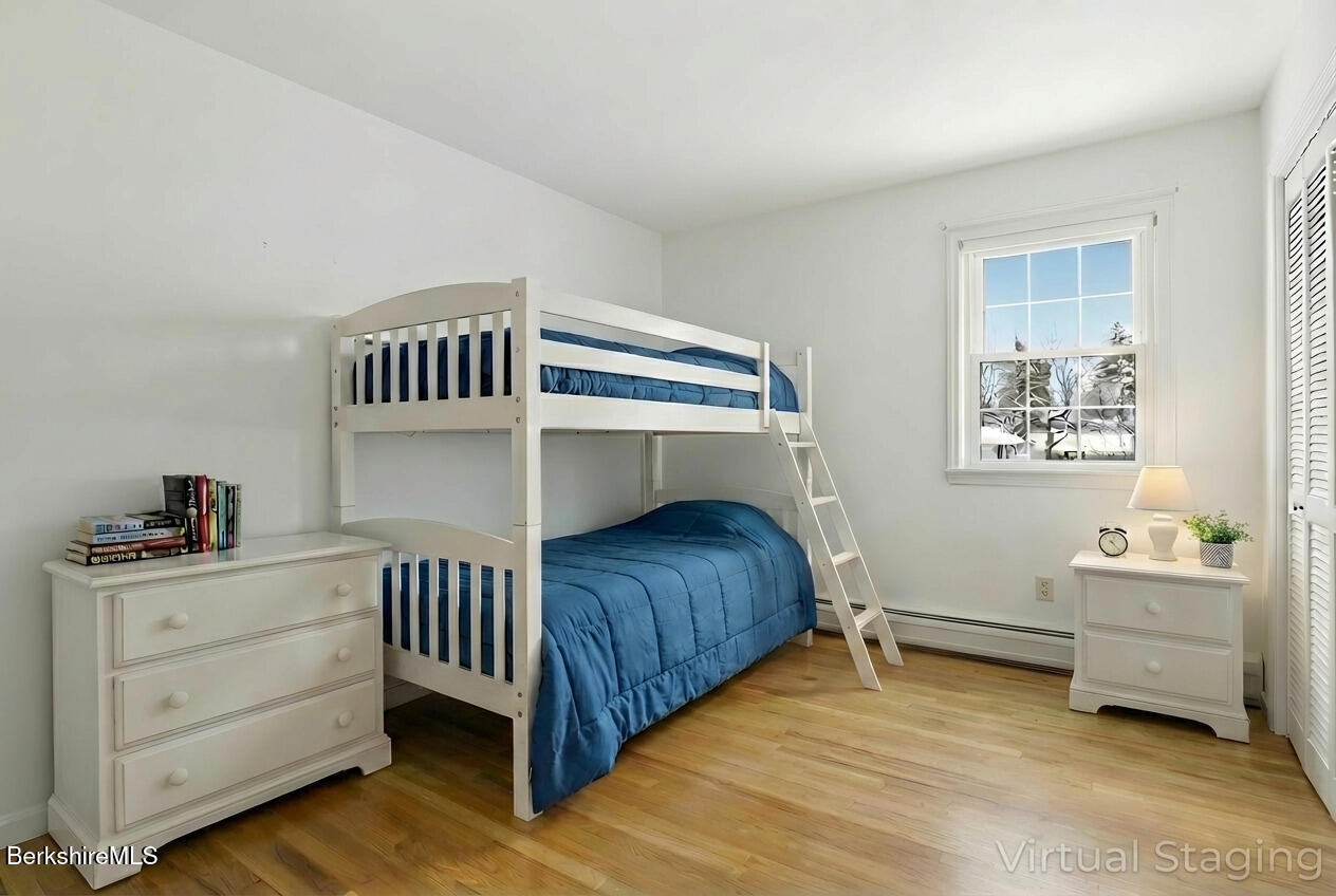 121 Kittredge Road Pittsfield, MA 01201 - Photo 29 of 38 a bedroom with a bed and a window