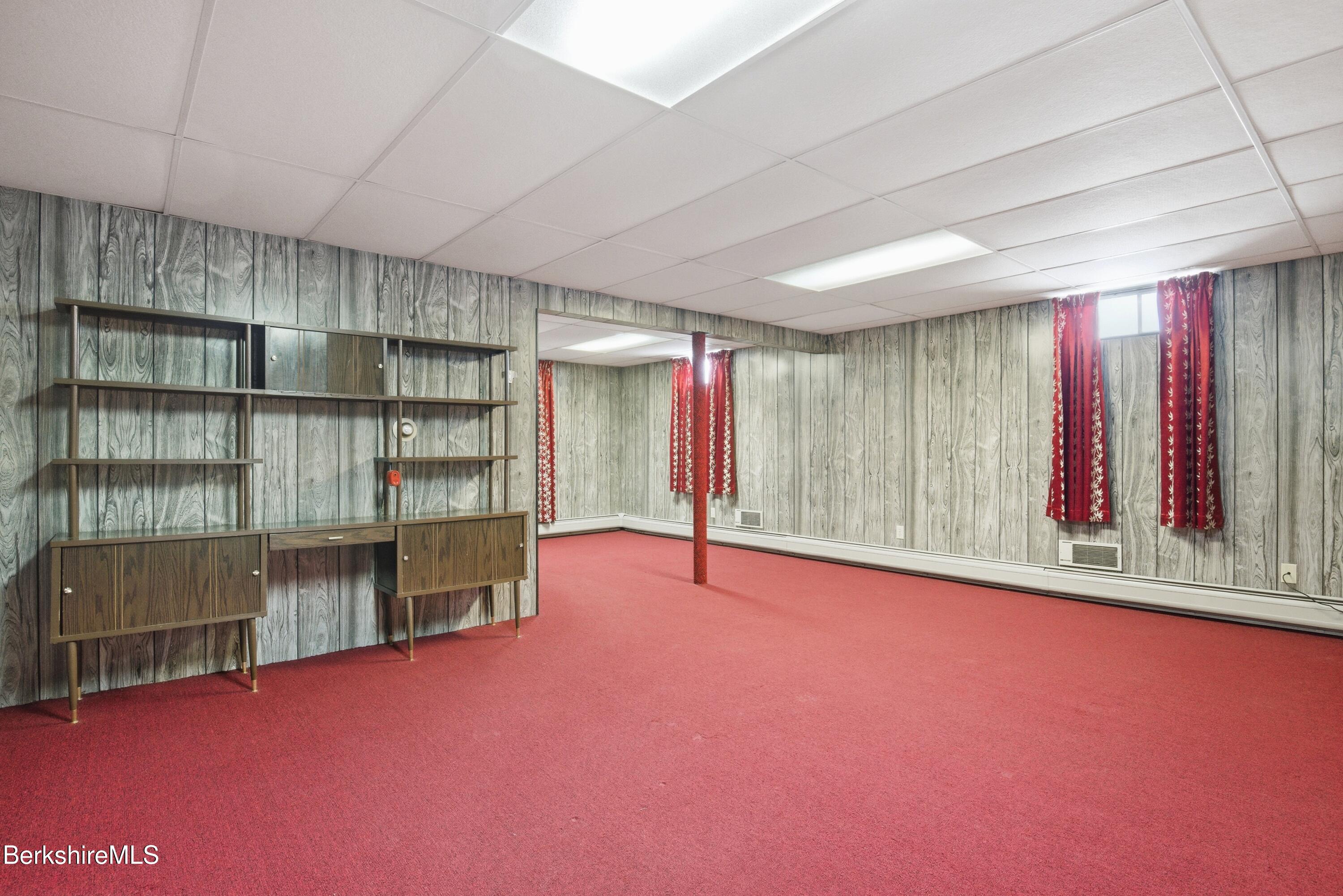 121 Kittredge Road Pittsfield, MA 01201 - Photo 36 of 38 an empty room with furniture and empty shelves