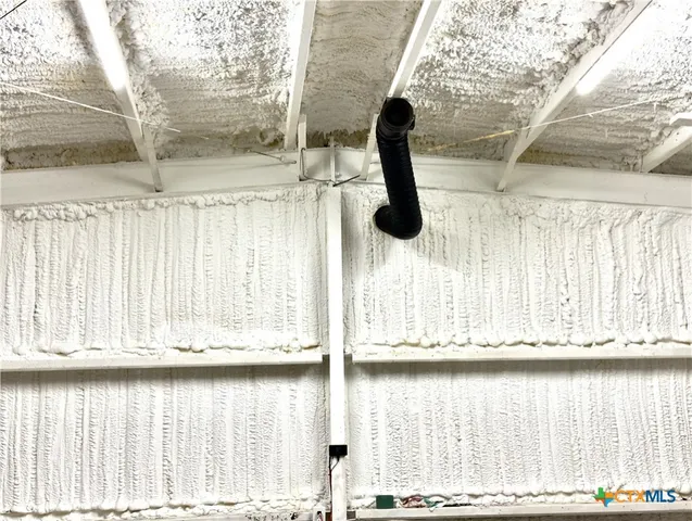 a view of walk in closet with large window