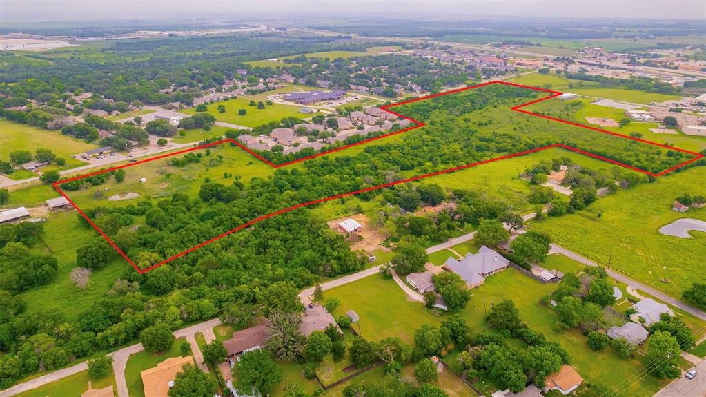 Na Old Brandon Road Hillsboro, TX 76645 - Photo 4 of 5 an aerial view of residential houses with outdoor space