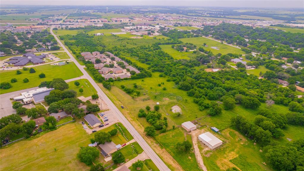 Na Old Brandon Road Hillsboro, TX 76645 - Photo 5 of 5 an aerial view of residential houses with outdoor space