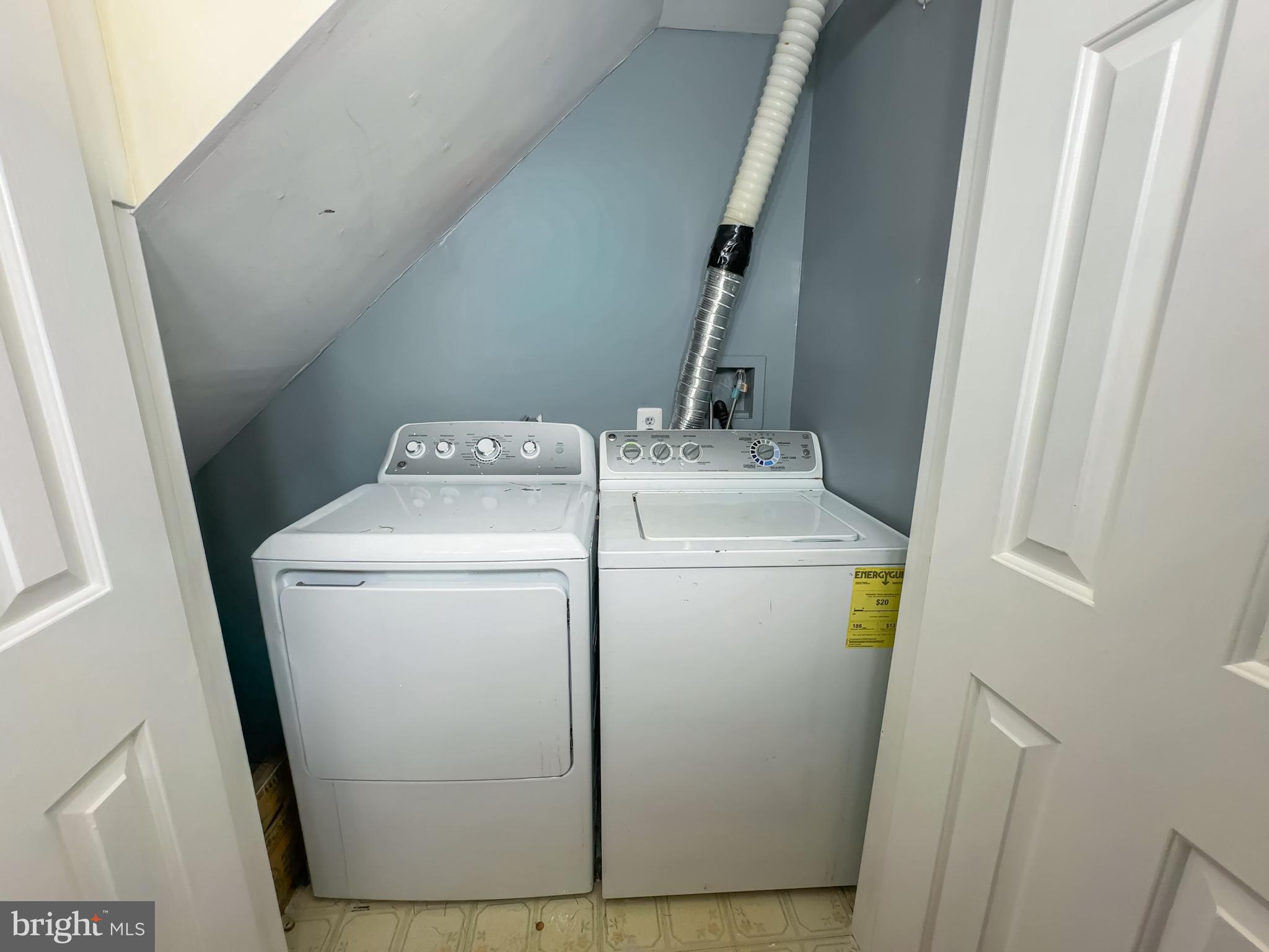 2863 Strauss Terrace Silver Spring, MD 20904 - Photo 13 of 23 a utility room with dryer and washer
