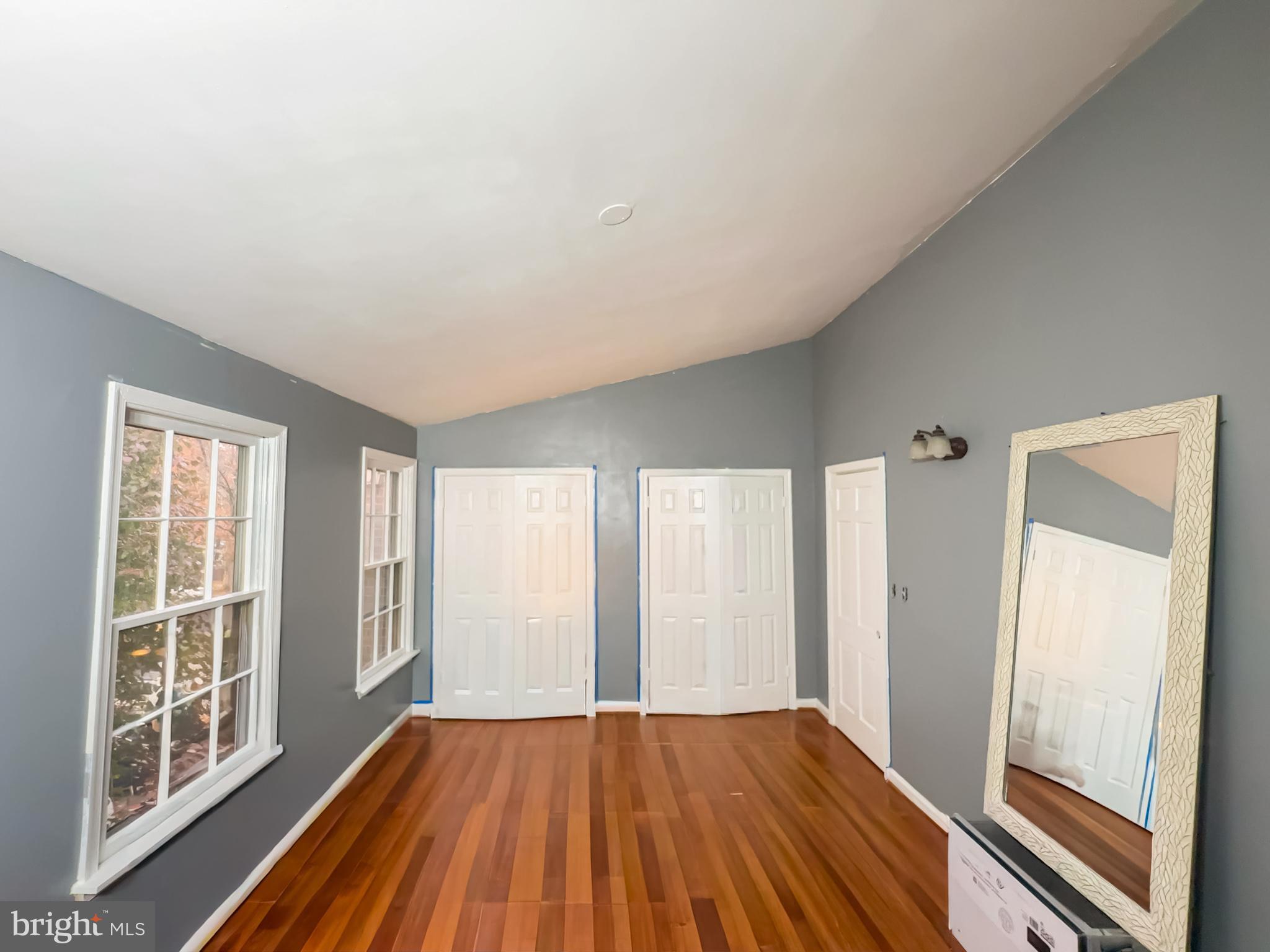 2863 Strauss Terrace Silver Spring, MD 20904 - Photo 21 of 23 a view of an empty room with glass door and wooden floor