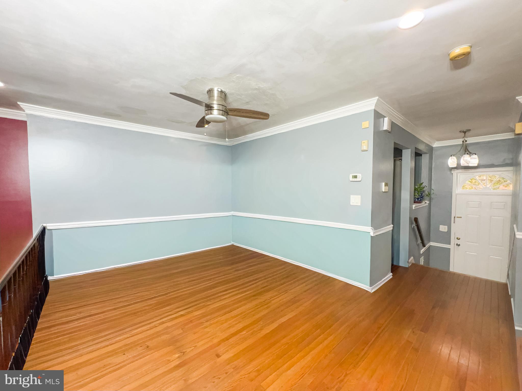 2863 Strauss Terrace Silver Spring, MD 20904 - Photo 3 of 23 a view of a room with wooden floor and white walls